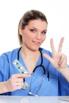 Three pills Stock Photos