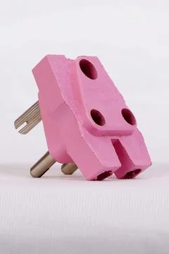 A three pin socket made of plastic Stock Photos