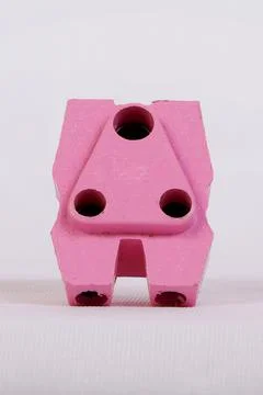 A three pin socket made of plastic Stock Photos