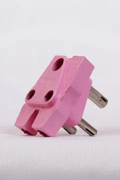 A three pin socket made of plastic Stock Photos