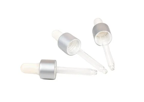 Three pipettes isolate Stock Photos