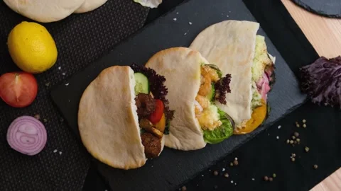 Three pitas lie on a beautiful background, Vegan food, shawarma with meat Stock Footage 138745738