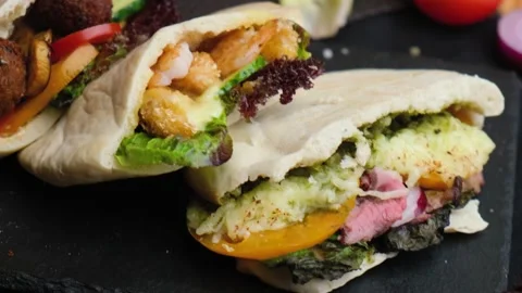 Three pitas lie on a beautiful background, Vegan food, shawarma with meat Stock Footage 138790806