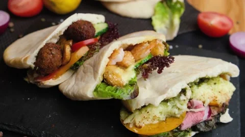 Three pitas lie on a beautiful background, Vegan food, shawarma with meat Stock Footage 138791523