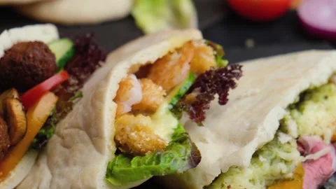 Three pitas lie on a beautiful background, Vegan food, shawarma with meat Stock Footage 138791749