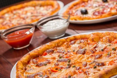 Three pizza suggestion of presentation menu with salmon Stock Photos