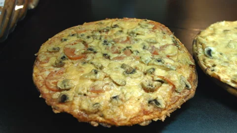 Three pizzas on the table. 2 Shots. Stockbeeldmateriaal 86702935