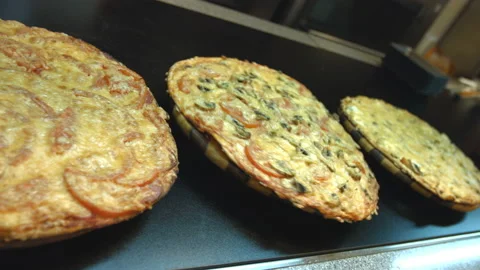 Three pizzas on the table. Stock-Footage 86704927