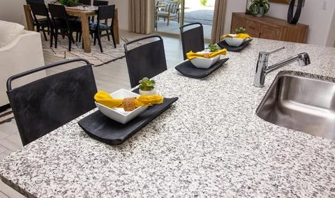 Three Place Settings On Kitchen Counter Island Stock Photos