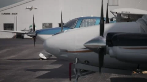 Three planes in the hangar Stock Footage 260578380