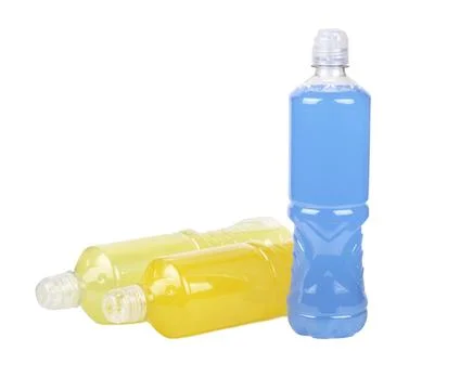 Three plastic bottles of isotonic drinks for sports multivitamin, orange and  Stock Photos