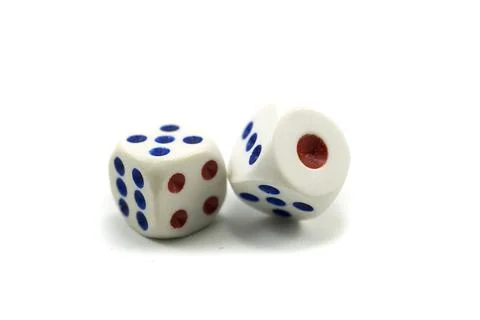 Three plastic dice isolated on a white background, a dice is a small object Stock Photos