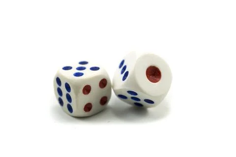 Three plastic dice isolated on a white background, a dice is a small object Stock Photos