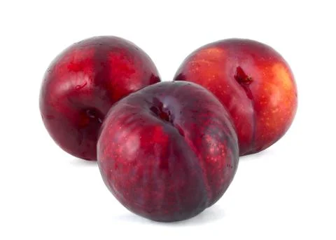 Three plums Stock Photos