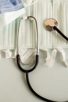 Three ply structure,single use hygenic face masks with stethoscope Stock Photos