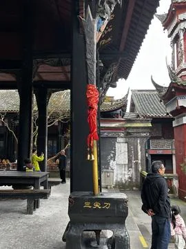 Three-Point Double-Edged Glaive with Red Cloth and Bells at Erwang Temple Stock Photos