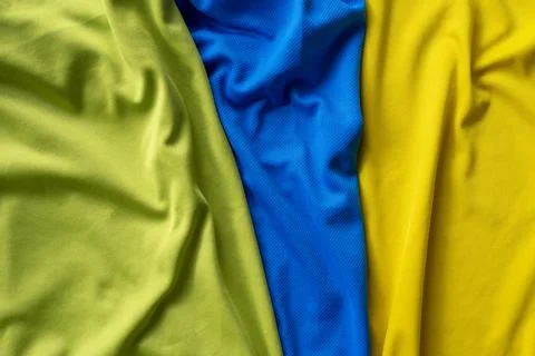Three polyester, nylon folded sport shirts, top view Foto stock