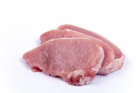 Three pork chops isolated over white background Stock Photos