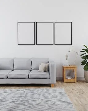 Three poster frames mockup in modern and minimalist interior of living room w Illustrazione stock