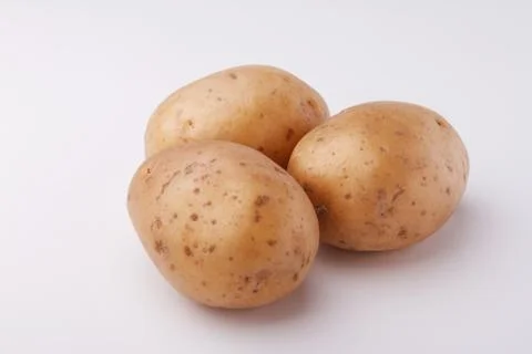 Three potato isolated on white background Stock Photos