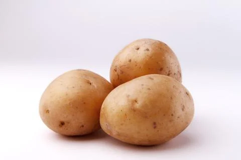 Three potato Stock Photos