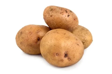 Three potatoes isolated on a white Stock Photos
