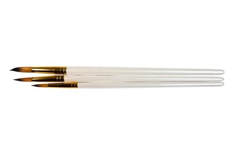 Three precision paintbrushes with white handles golden ferrules tapered bri.. Stock Photos