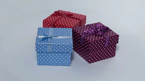 Three present boxes rotating loop Stock Footage 32356738