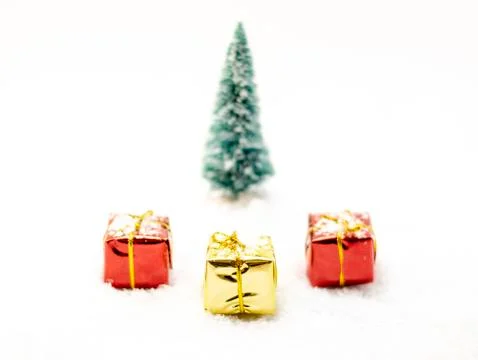 Three presents, two red and one yellow with ribbons isolated on white, Christ Stock Photos