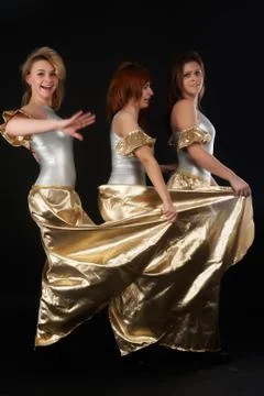 Three pretty girls dancing Stock Photos
