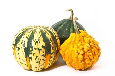 Three pumpkins before white background Foto stock