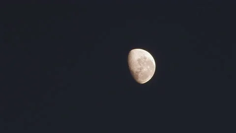 Three quarter Moon with a focus pull in the middle of the shot. Stock-Footage 136220168