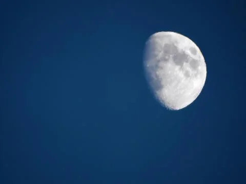 Three Quarters Moon on Cloudless Sky 스톡 사진