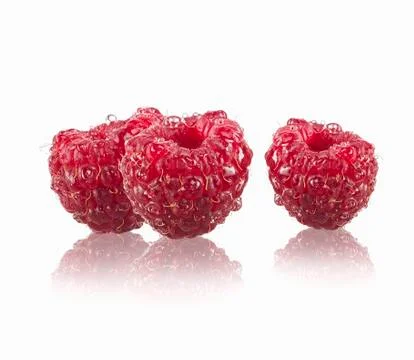 Three raspberries Stock Photos