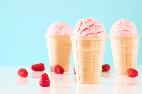 Three raspberry ice cream cones Stock Photos