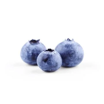 Three raw blueberries isolated on white with clipping path Stock Photos