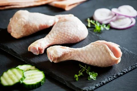 Three Raw Chicken Legs Stock Photos