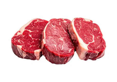 Three raw marbled steak cuts on white background Stock Photos