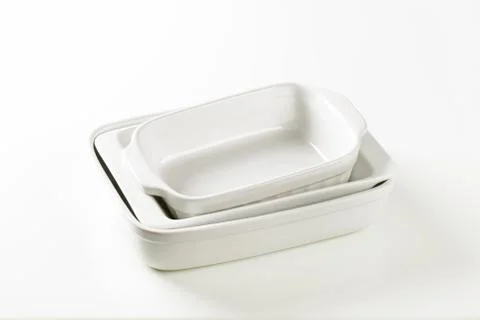 Three rectangular white porcelain baking dishes Fotos de archivo
