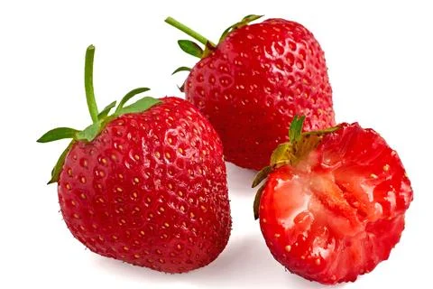 Three red appetizing strawberries isolated on a white background Stock Photos