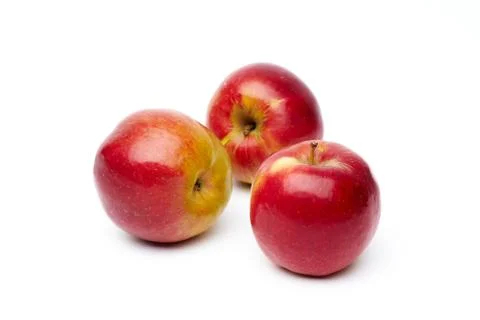 Three red apples isolated on a white background Stock Photos