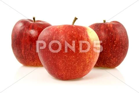 Three red apples Stock Photos