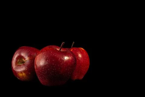 Three red apples Fotos de archivo