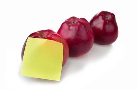 Three red apples with stiker note Stock Photos