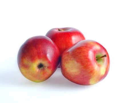 Three red apples on a white background Stock Photos