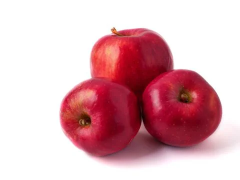Three red apples on white background. Stock Photos