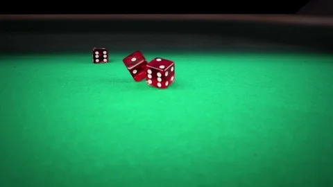 Three red dice rolling on green game gambling table on black background 스톡 동영상 80039523