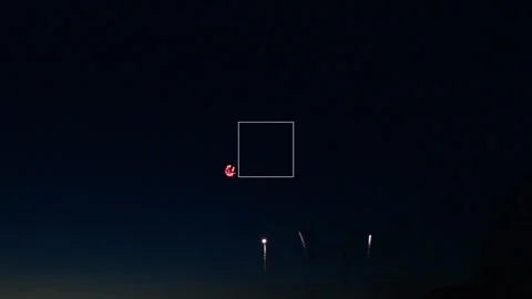 Three red fireworks in the night sky Video stock 194494258