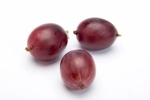 Three red Gooseberries Stock Photos
