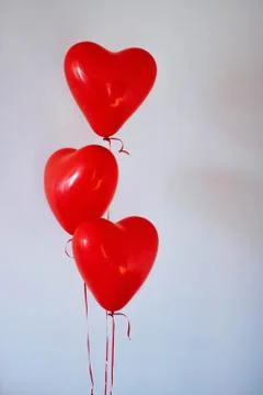 Three-red-heart-balloons Stock Photos